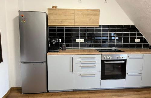 Dachgeschosswohnung im 3-Städteeck - Foto 11