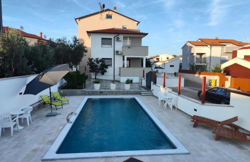 Apartments Ivana with the pool - Photo 1