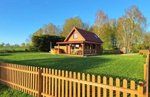 Caloroczny domek letniskowy ze stawem - Foto 49