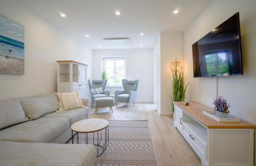 Sonnenterrasse - Helle & moderne Ferienwohnung am Meer - Foto 2