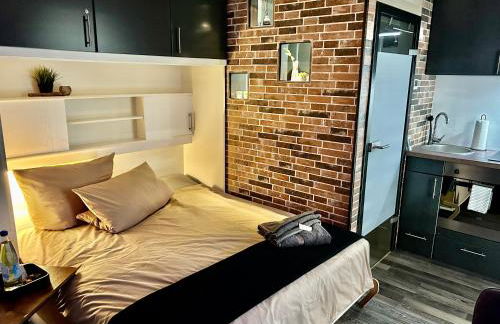 LIVE-IN Tiny Studiowohnung - Foto 1