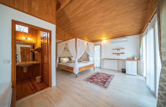 Etenna Beach Bungalows - Photo 3