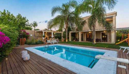 Aria Villas - Private Pool, Playground, Ping Pong & Close to Beach, By ThinkVilla - Foto 5, Garden