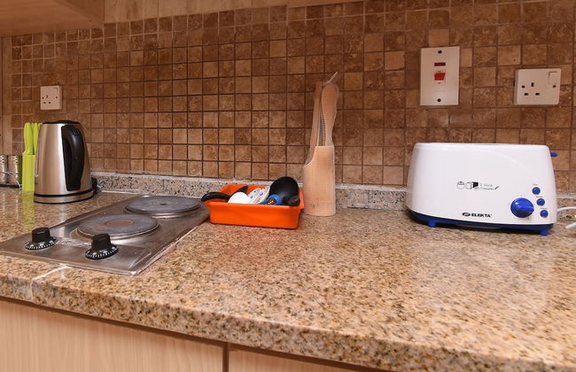 OYO Home 2351BHK Capitol Tower DIC - Photo 12