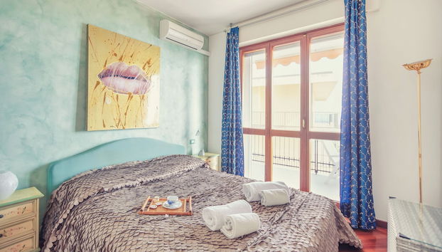 Le Orchidee 10 Apartment - Foto 3, Habitación