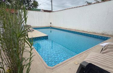 Casa Praia Grande 5min praia, 2 vagas, wi fi , 3 banheiros , piscina grande , freezer extra gelo , churrasqueira , até 9 pessoas - Photo 48