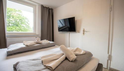 Messe-Apartment für 5 Gäste mit Balkon und Lift - Foto 3, towels