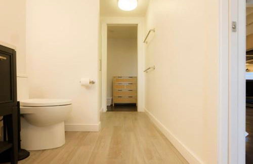 Above The Roots - Sophisticated 1BD Retreat - Photo 24