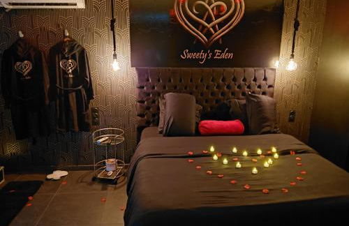 Sweety's Eden Jacuzzi - Jacuzzi privé Sauna Cinéma room Jardin - Terrasse centre-ville - Foto 1