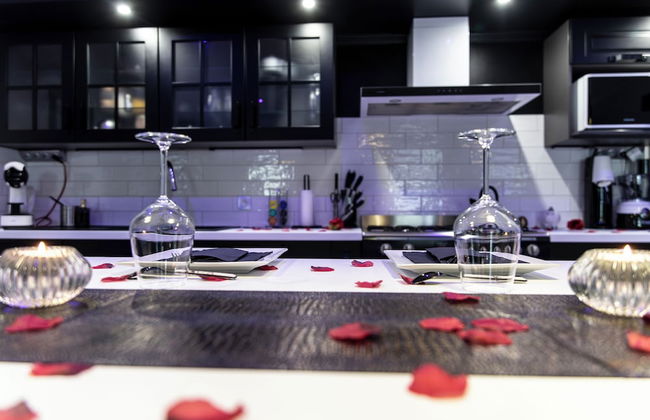 Appart Hotel GLAM88 Suites SPA et SAUNA - Photo 12