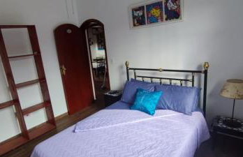 Casa Rosa de Peruíbe - Casa de Temporada 3 dormitórios, 10 hóspedes, piscina, wi-fi, netflix, 800 metros da praia - Photo 32