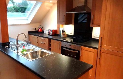 Coach House at The Glen - Foto 8