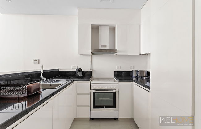 WelHome - Charming Breathtaking 1BR Apt. In Damac Hills - Photo 10