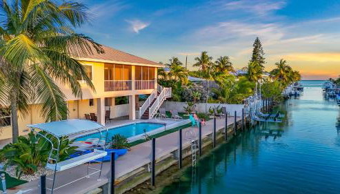 NEW!Paradise PalmsDockPoolKayaks GrillView! - Foto 4