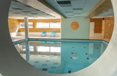 APT T2 4 COUCHAGES dans RES. 4 * - BALCONS des AIRELLES (1800) coeur de station - Photo 11