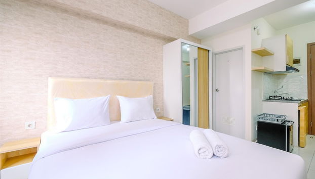 Nice and Warm Studio at Podomoro Golf View Apartment - Foto 2, Habitación