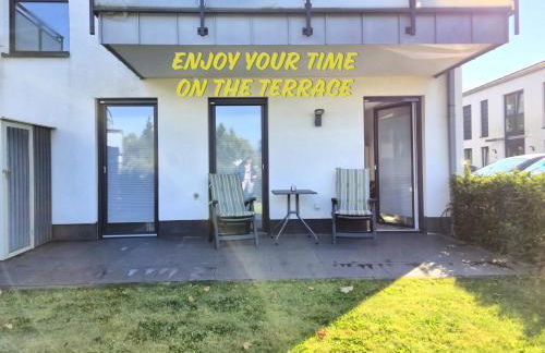 Modernes Apartment mit Terrasse & Garten, Parkplatz & 24h Self-Check-in - Foto 22