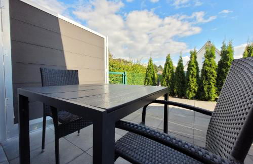 Hochwertige Ferienwohnung in ruhiger Lage mit eigener Terrasse und Parkplatz, nur 7 Gehminuten zum Strand entfernt - hoher Schlafkomfort dank Boxspringbett - Foto 8