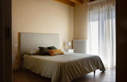 Casa con ampio terrazzo, vista lago e giardino - Foto 11