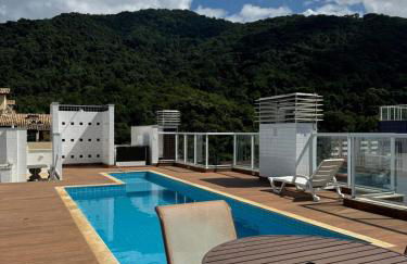 Apartamento na Praia das Toninhas em Ubatuba 350m da praia -2 quartos sendo 1 suite, piscina, varanda gourmet com churrasqueira, ar condicionado, cozinha completa, duas garagens - Foto 36