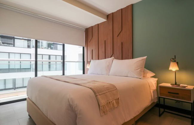 w Captivating 1BR in San Isidro - Photo 2