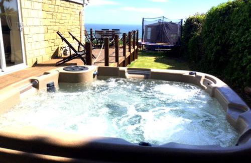 Coastal retreat with stunning sea views - Photo 19