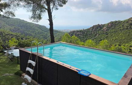 casa y piscina en un parque natural - Photo 9