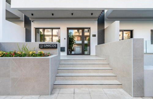 Unicos City Suites - Photo 6