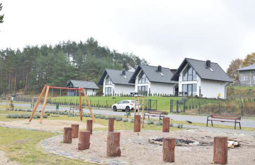 Domki U Zbyszka nad jeziorem z balią ogrodową! - Foto 12