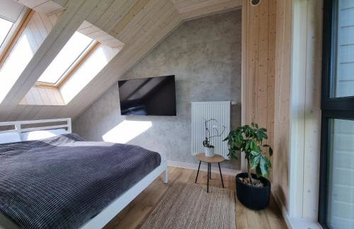 Osada Miłojeż - całoroczne Domy Premium w Borach Tucholskich, Jacuzzi pod gwiazdami - Foto 23