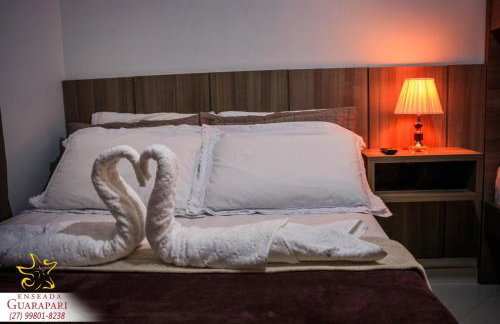 MAIOR NOTA - 2 Quartos com AR CONDICIONADOS SPLIT, Air Fryer, Wi-Fi, Disney Plus, Star Plus, HBO Max, Cadeiras de Praia, Caixa Térmica, Churrasqueira, Rede para Descanso e Chuveirão - 8 pessoas - CONFORTO Máximo - Melhor Localização!! - Photo 9