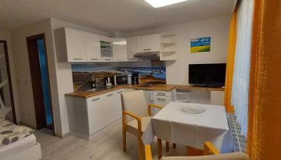 Appartement auf Rügen - Foto 2, stove, minibar