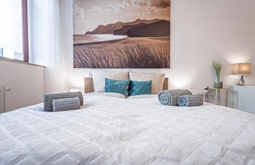 Gemütliche Ferienwohnung mit 2 Schlafzimmern, kostenfreiem Parkplatz, modernem Bad, Küche, Waschmaschine & Trockner - Foto 10