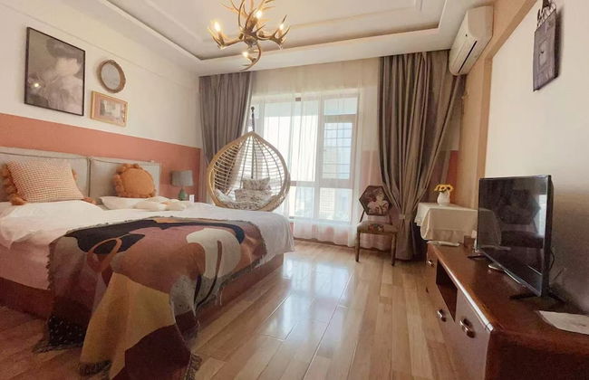 Dalian Bo Ke Business Apartment - Foto 19