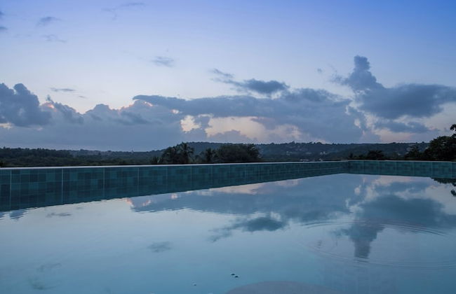 ELIVAAS Kamerios Verano 1 BHK with Pool - Photo 54