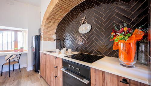 The Nest Masia Can Tiranasi Relájate y Disfruta Escapada con Encanto Cerca de Barcelona- - Photo 4, stove