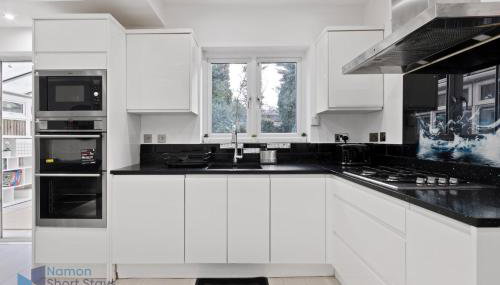 Large Comfy 4 Bedroom House, Ideal for Workers, FREE Parking - Foto 4, stove, dishwasher, toaster