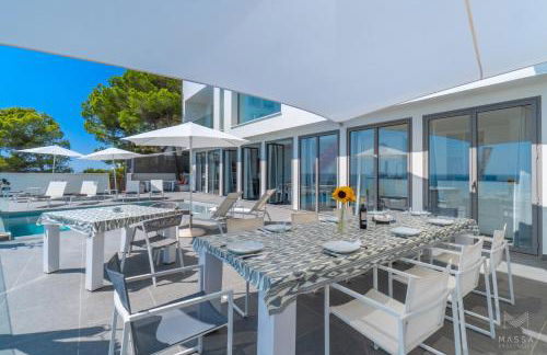 Can Ema, villa moderna con piscina frente al mar - Foto 14