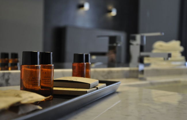 Place 24 Suites & Wellness - Photo 23