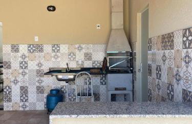 Apartamento em Poços - Varanda com Churrasqueira - Foto 3