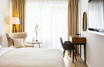 Moderne Ferienwohnung mit Sonnenterrasse & Gartenblick - Strandnah und Parkplatz in ruhiger Lage - hoher Schlafkomfort - Foto 1