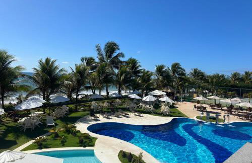 Flat Guarajuba - 3 quartos 2 andar à Beira Mar - pé areia - governança com arrumadeira e Wi Fi inclusos - Foto 25