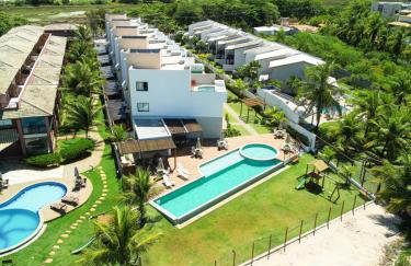 Casa Turquesa Pé na areia Piscina infinita Pet friendly Condomínio fechado - Foto 1