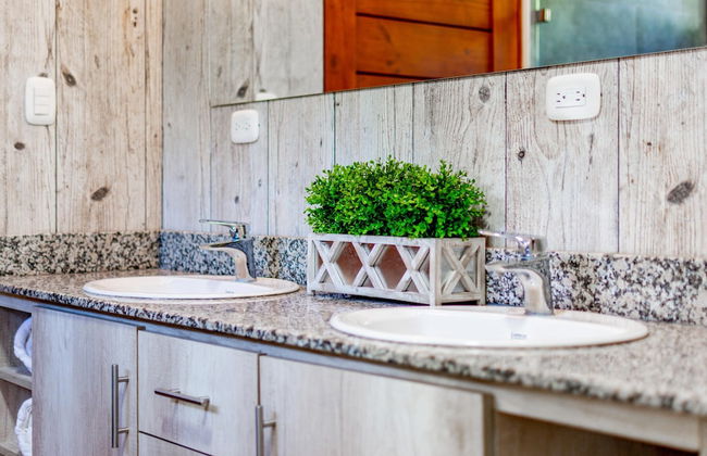 Ultramodern Townhome with an Inviting Coastal Design and Lush Outdoor Oasis with a Private Pool - Photo 12