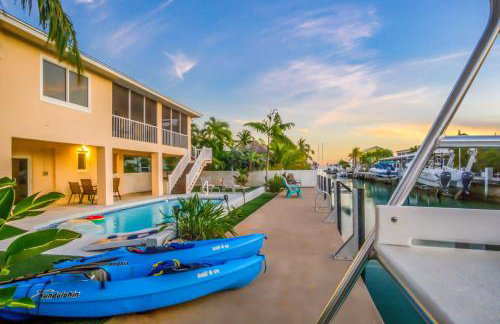 NEW!Paradise PalmsDockPoolKayaks GrillView! - Foto 30