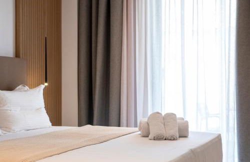 Unicos City Suites - Photo 21