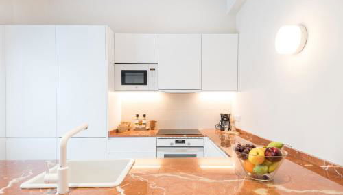 Mediterranean Retreat with 4-Bedroom, 3-Bath Apartment in Barcelona - Foto 4, stove