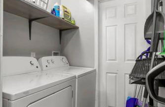 Stylish 2BR Dual-Kitchen Retreat Near Forest Park - Photo 19