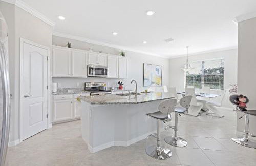 Modern waterfront home in Artesia with pool/gym - Photo 8