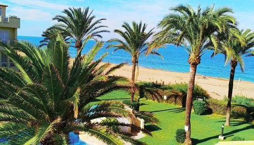 Estupendo apartamento en primera línea de playa y con vistas al mar - Foto 3, Garden view